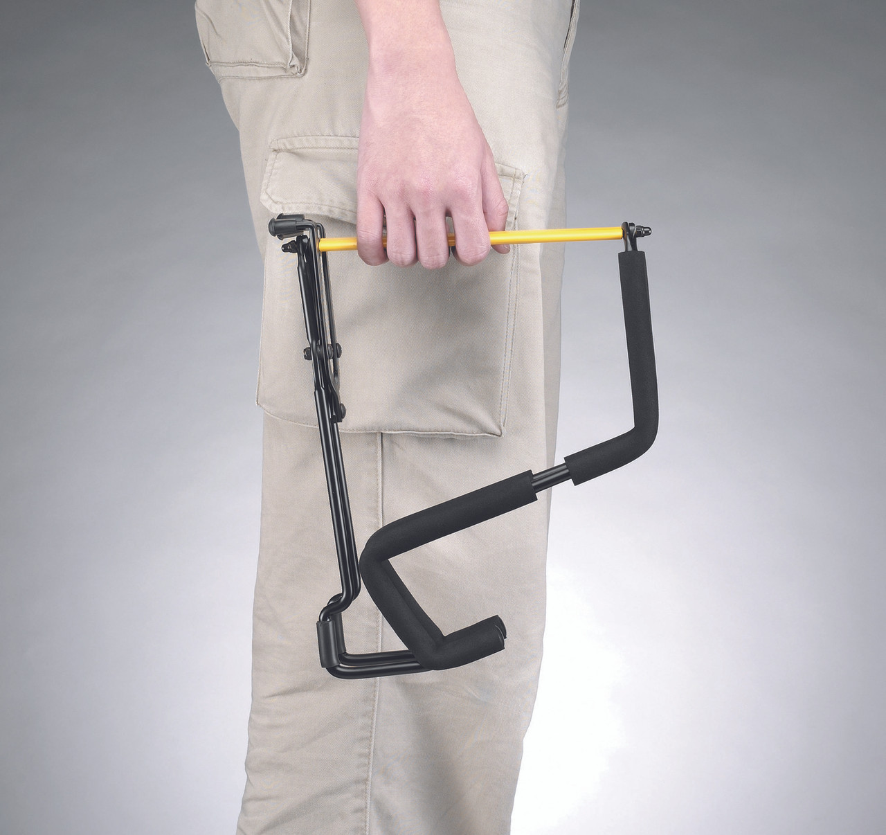 Hercules GS302B TravLite Electric Guitar Stand featuring a foldable lightweight design, padded arms, and secure support ideal for electric guitars and travel convenience.