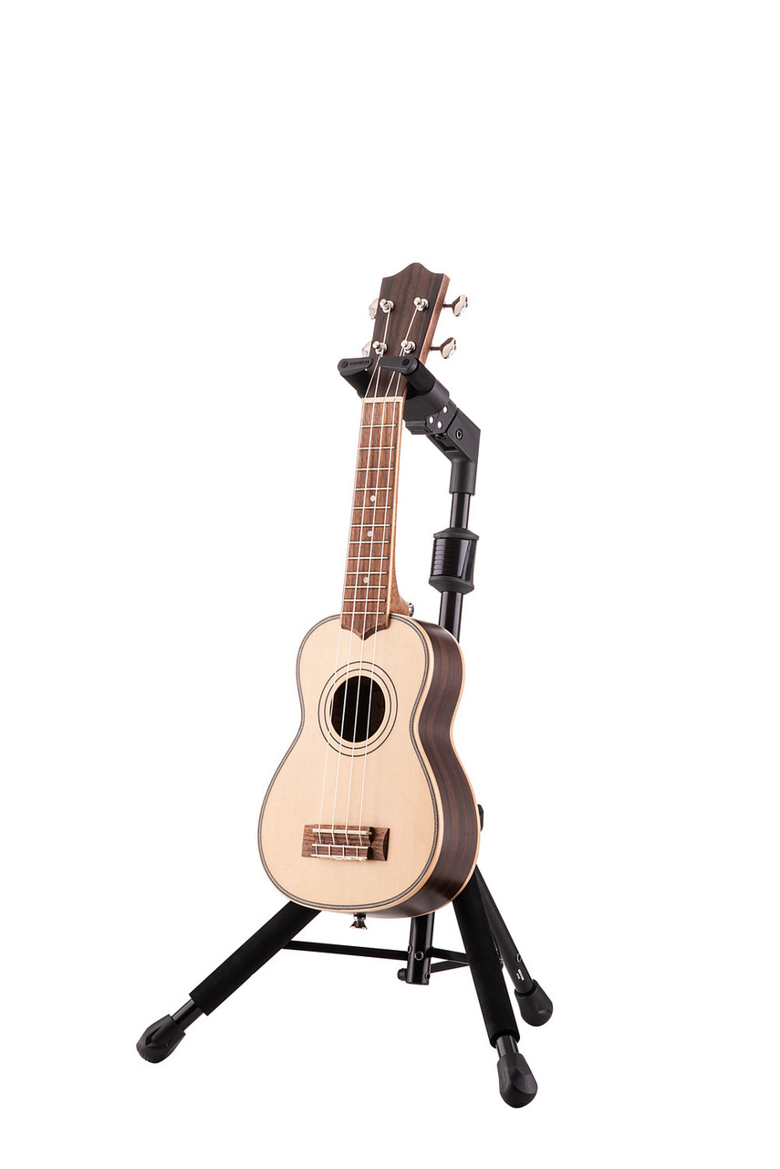 Hercules UKS100B Auto Grip Ukulele Stand featuring AGS automatic neck locking, padded support arms, and a stable foldable frame compatible with all ukulele sizes.