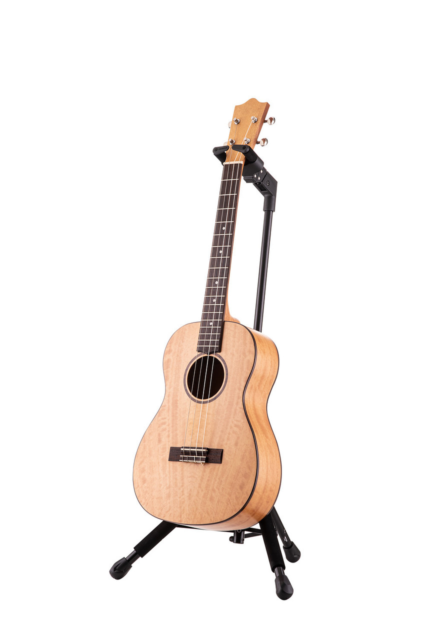 Hercules UKS100B Auto Grip Ukulele Stand featuring AGS automatic neck locking, padded support arms, and a stable foldable frame compatible with all ukulele sizes.