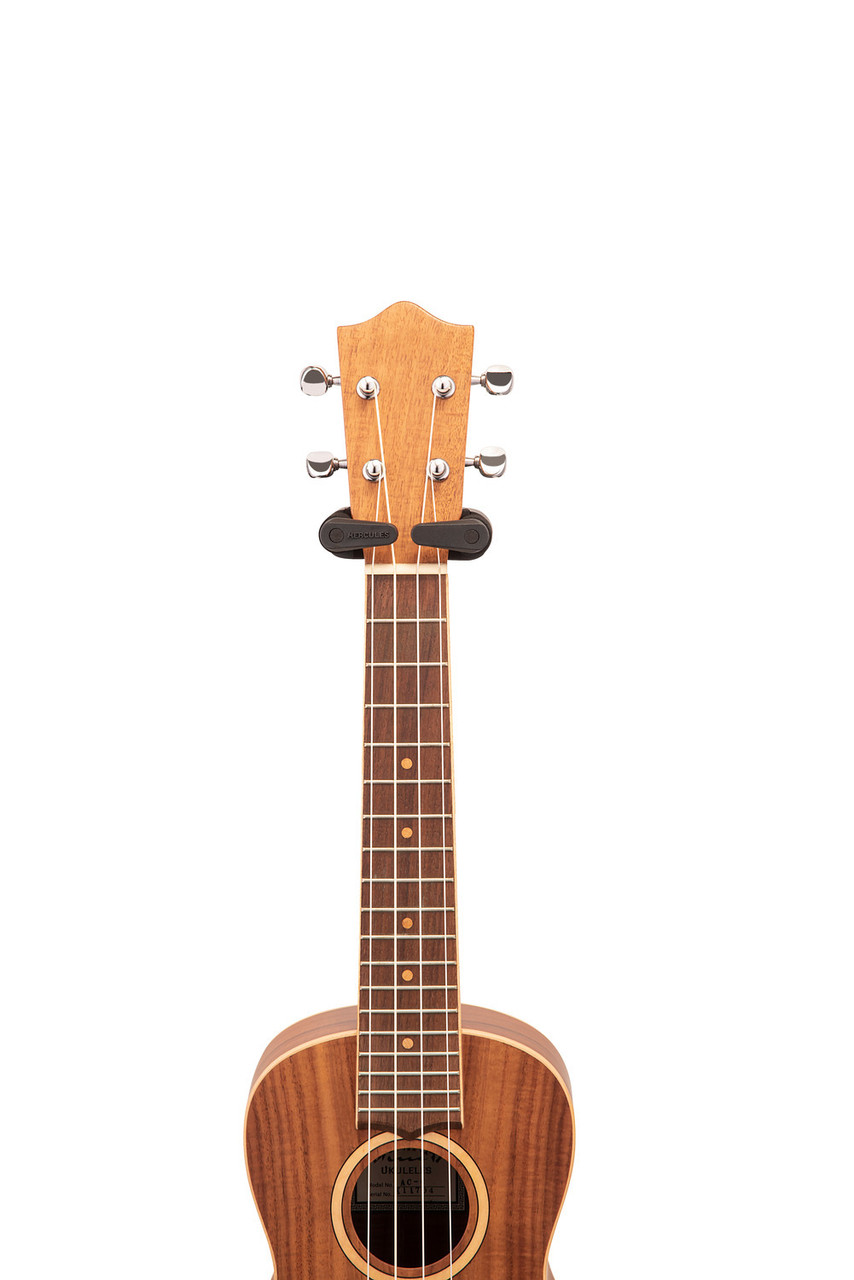 Hercules UKS100B Auto Grip Ukulele Stand featuring AGS automatic neck locking, padded support arms, and a stable foldable frame compatible with all ukulele sizes.