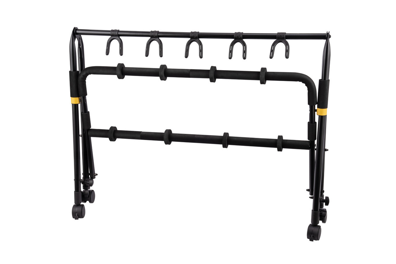 Hercules GS525BPLUS 5-Piece Guitar Rack Stand with Casters featuring padded supports, foldable durable frame, and rolling casters for easy transport of up to five guitars.