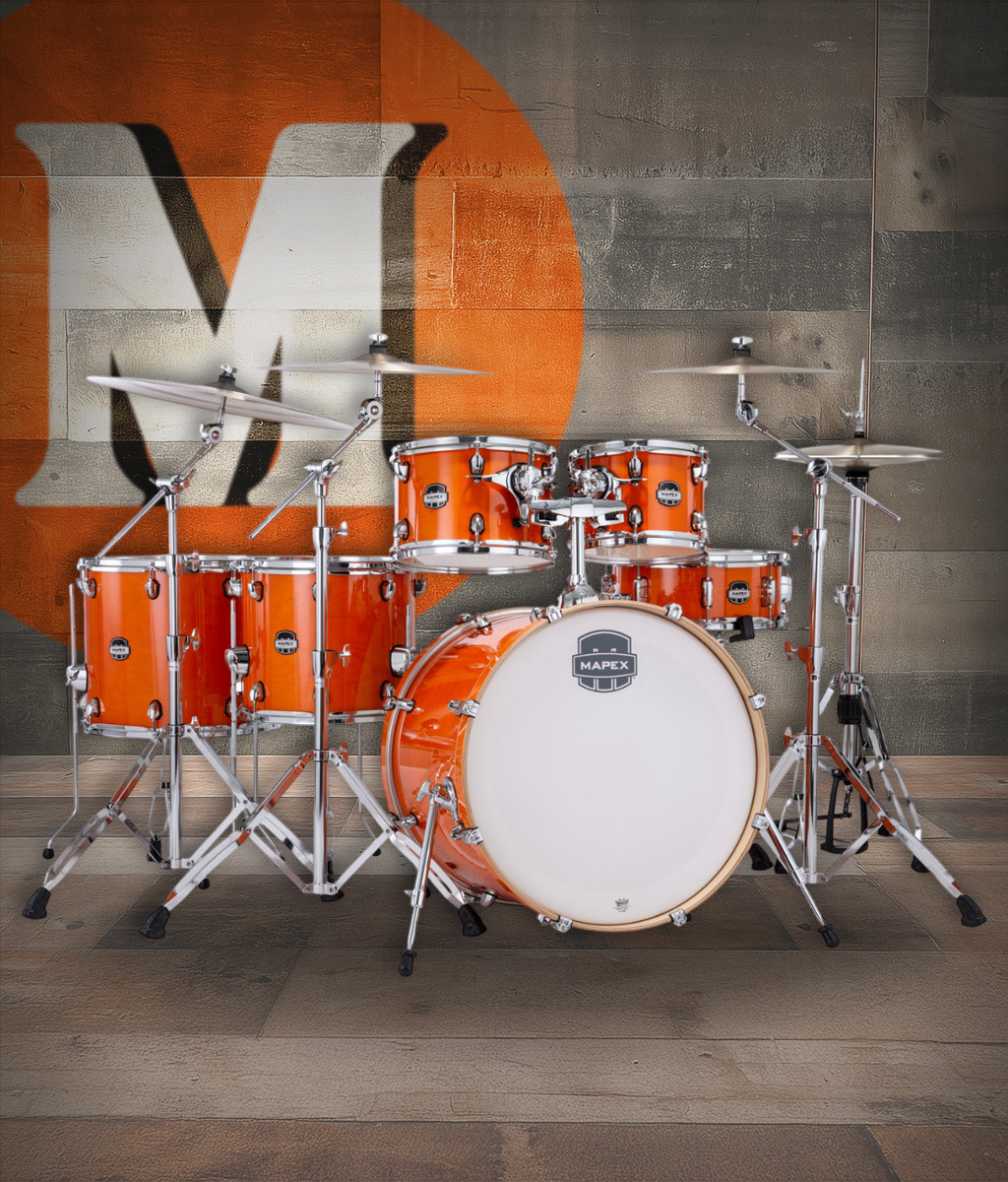 The Mapex Mars Maple MM628SFUOG Studioease Shell Pack features 100% maple shells that deliver warm resonance, smooth mids, and articulate highs. The fast tom Studioease setup enhances responsiveness and tonal clarity, while the Glossy Amber finish provides a striking stage-ready appearance. With SONIClear bearing edges for easier tuning and improved head-to-shell contact, this kit is ideal for versatile drummers performing in studios or on stage.