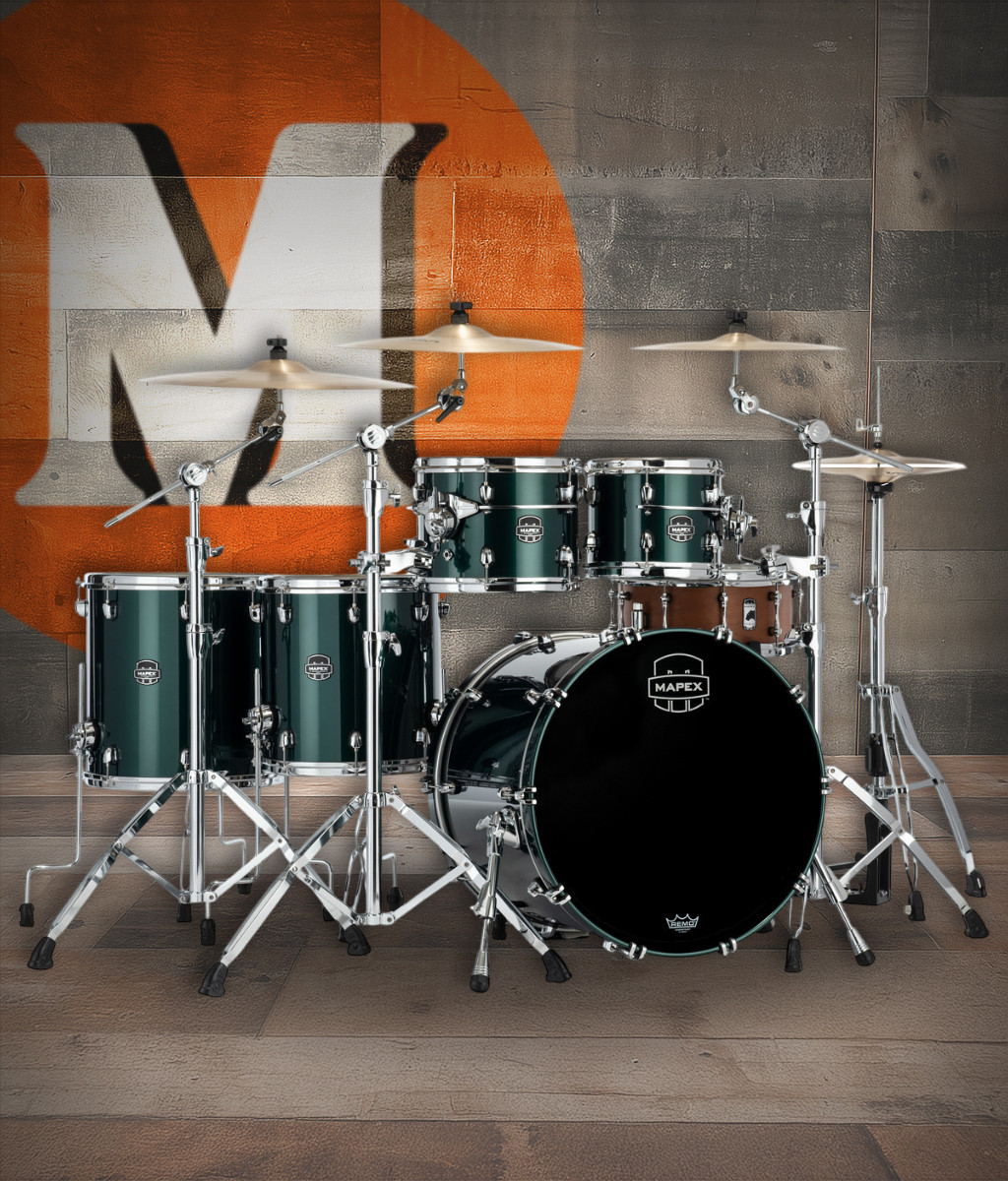 The Mapex Saturn Evolution SE628XMPQ Workhorse 5-Piece Shell Pack features hybrid maple/walnut shells engineered for superior projection, warm low-end, and detailed clarity. Its Brunswick Green finish offers a bold, refined appearance suited for stage or studio. Enhanced with SAS Attack and Resonance systems and SONIClear bearing edges, this kit delivers exceptional tuning stability, responsive dynamics, and premium performance for professional drummers.