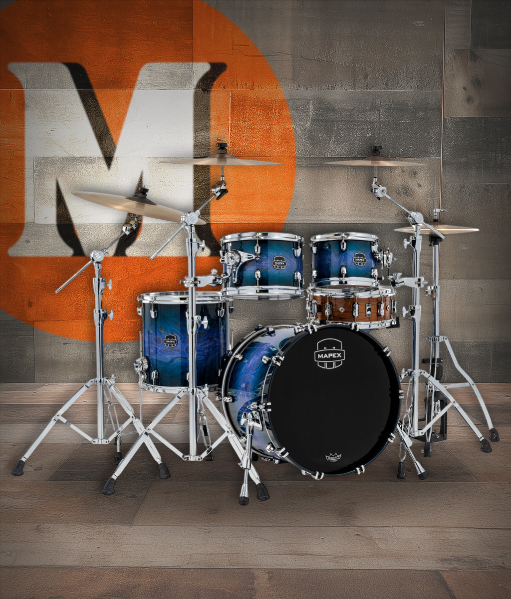 The Mapex Saturn VI SR504XZXQ Fusion 4-Piece Shell Pack features hybrid maple/walnut shells that deliver rich lows, articulate mids, and crisp high-end attack. Its Cobalt Burst finish adds bold stage presence, while SONIClear bearing edges improve tuning stability and enhance overall resonance. Ideal for drummers who need a versatile, refined kit for studio sessions or live gigs.