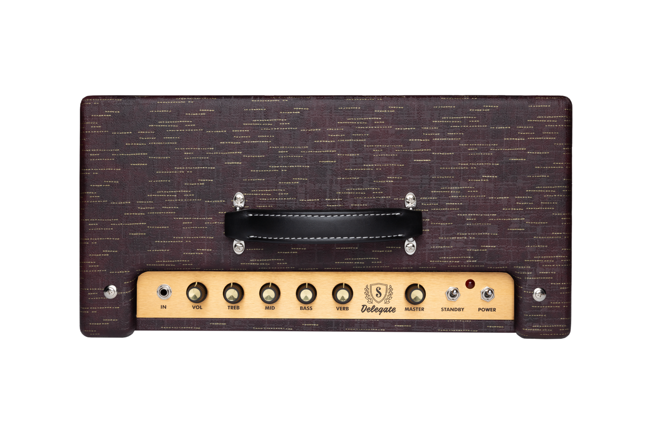Supro Delegate 1x12 combo amplifier in Burgundy Gold Scandia featuring 25-watt tube power, built-in reverb, classic Supro circuitry, and expressive tonal character.