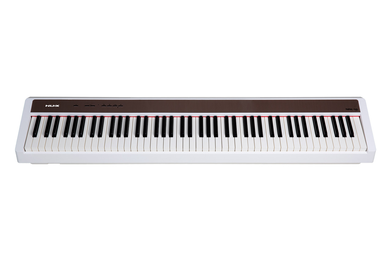 Shop the NUX NPK-10 Portable Digital Piano with Dual-Mode Bluetooth in White (NPK10WH) at Musician Madness. Sleek design, modern connectivity, and expressive sound.
