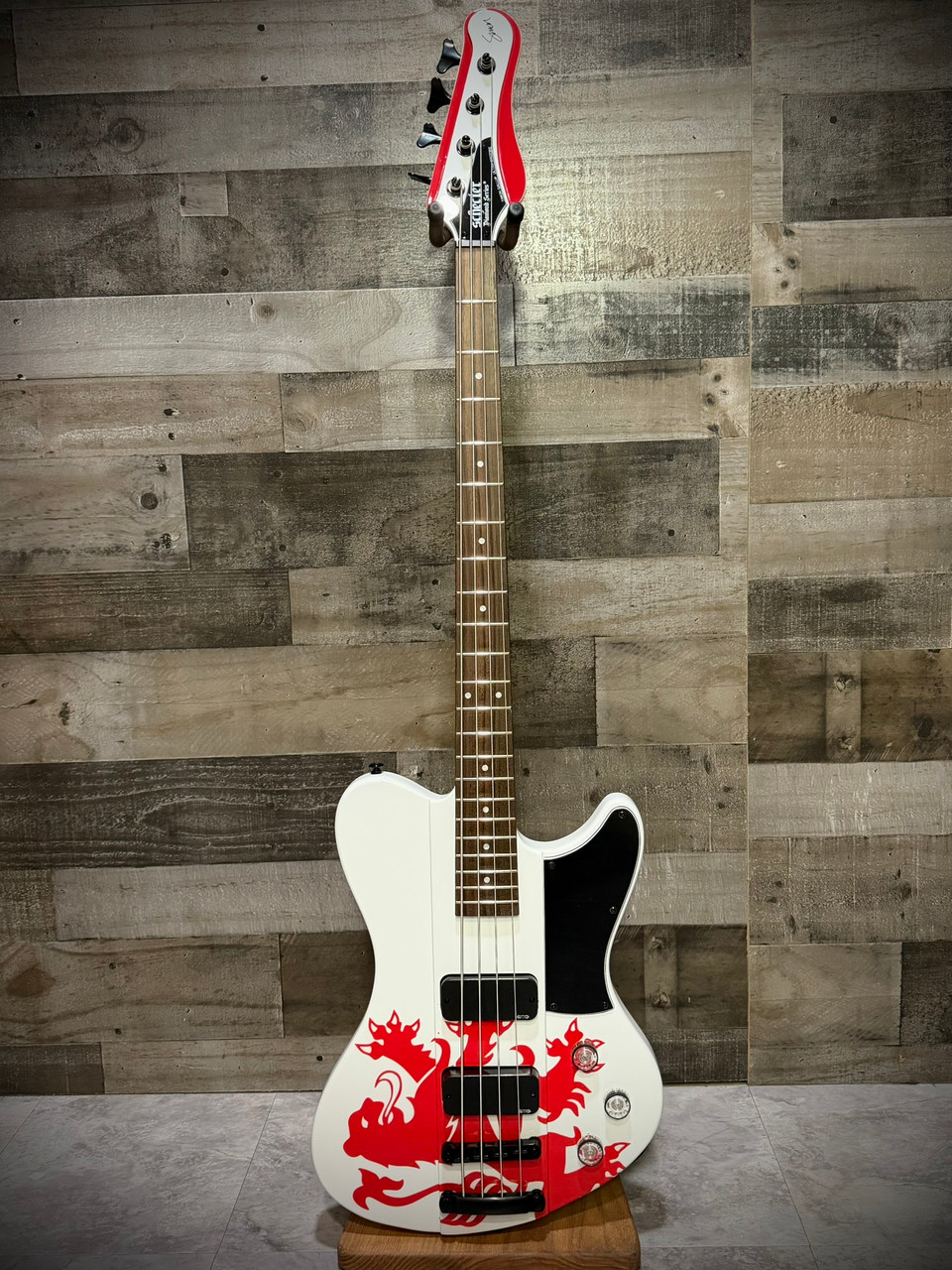 Schecter Simon Gallup Ultra Spitfire Bass Guitar - Gloss White with Red Lion Graphic (2254) | Musician Madness