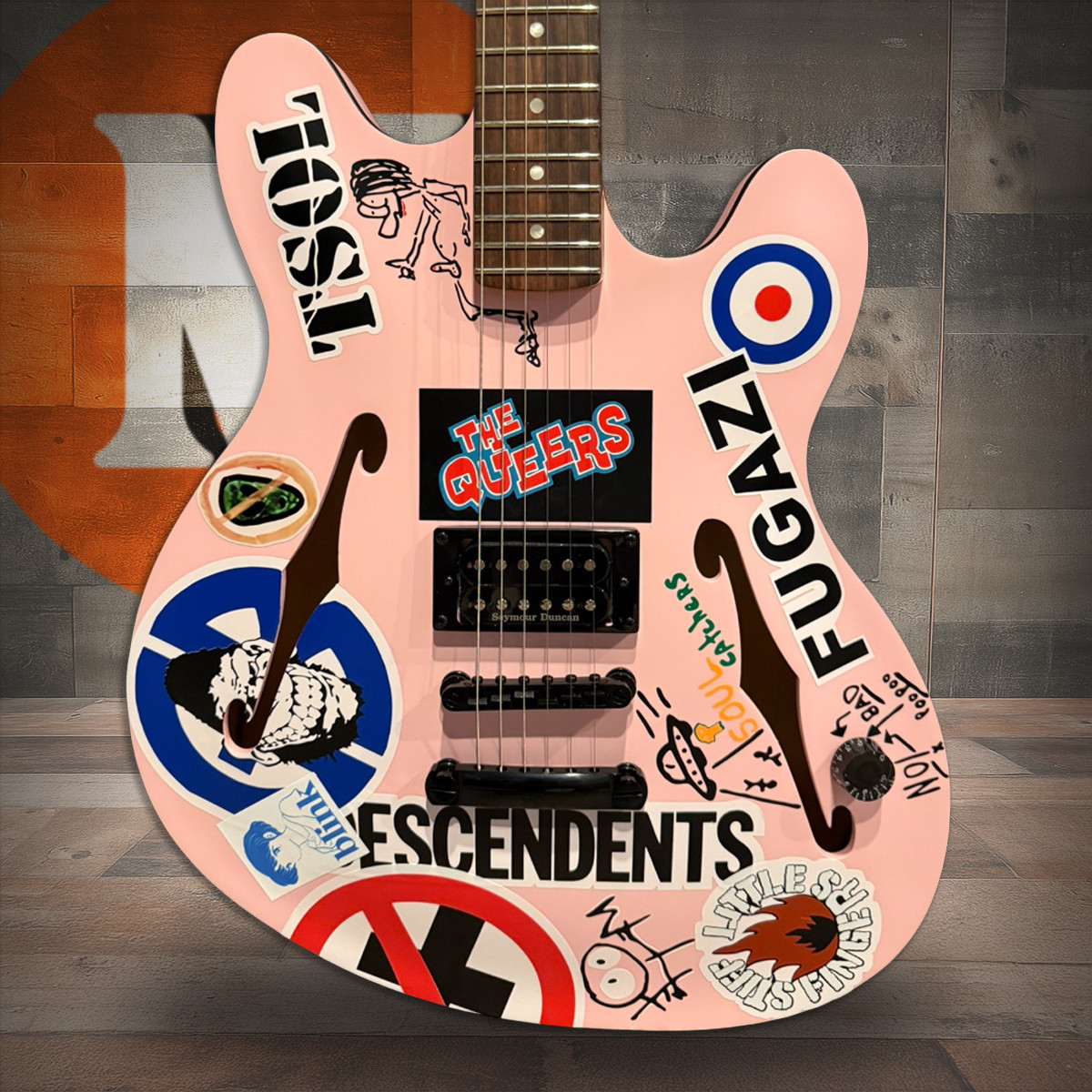 fender, tom delonge starcaster, starcaster electric guitar, satin shell pink guitar, offset electric guitar, punk rock guitar, signature electric guitar, musician madness