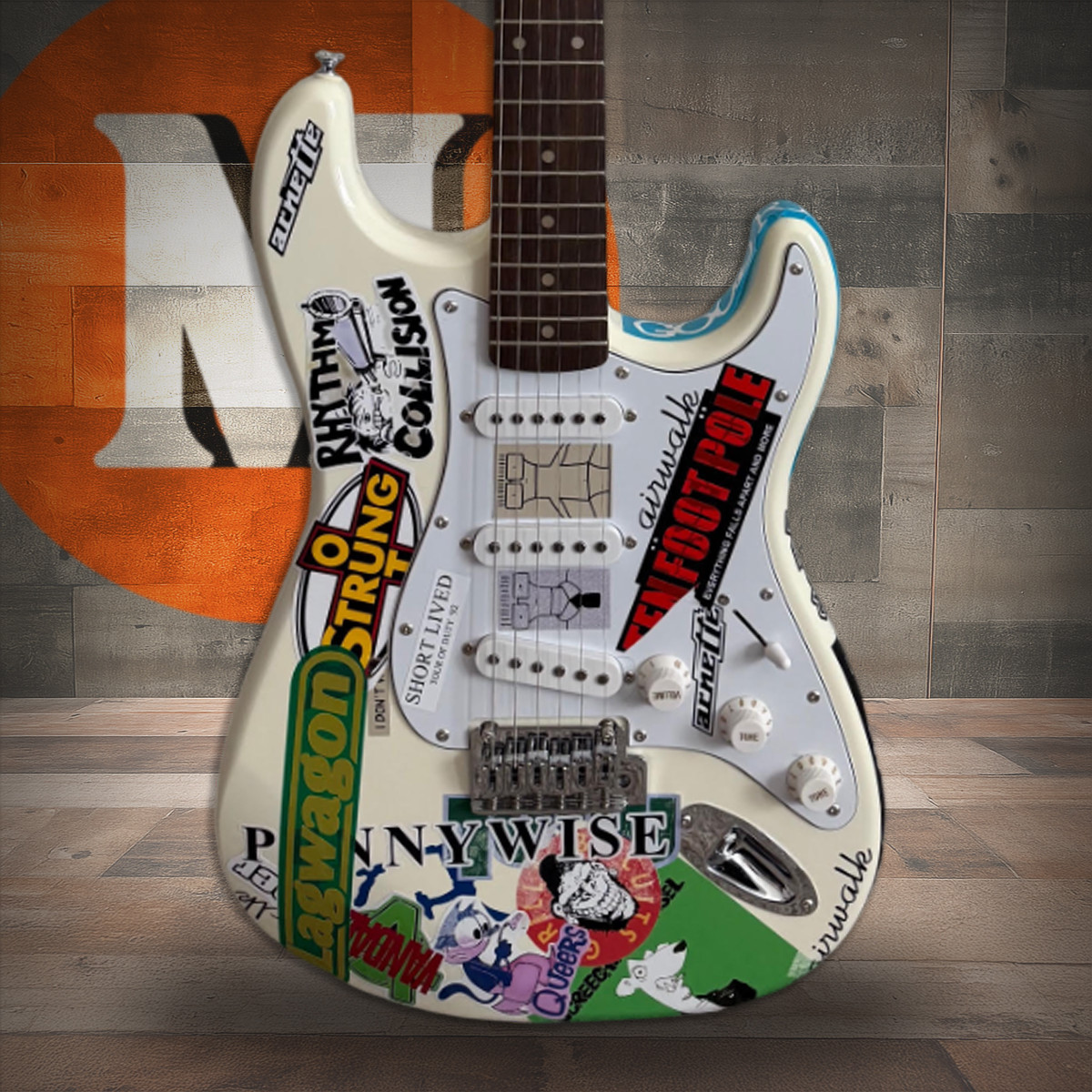 Fender Squier Stratocaster Tom DeLonge Sticker Strat Electric Guitar in Olympic White delivers classic Strat tone with a bold, tour-inspired custom look. Shop at Musician Madness.