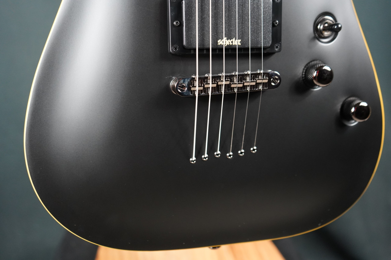 Schecter Demon-6 Electric Guitar - Aged Black Satin (B-Stock) featuring active pickups, arched top body, sleek satin finish, and smooth neck for fast modern playability
