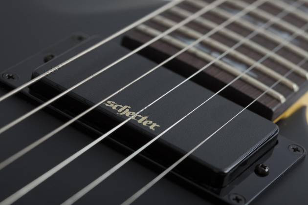 Shop the Schecter Demon-6 FR Electric Guitar in Aged Black Satin (3661) at Musician Madness. Floyd Rose performance, aggressive tone, and fast shipping.