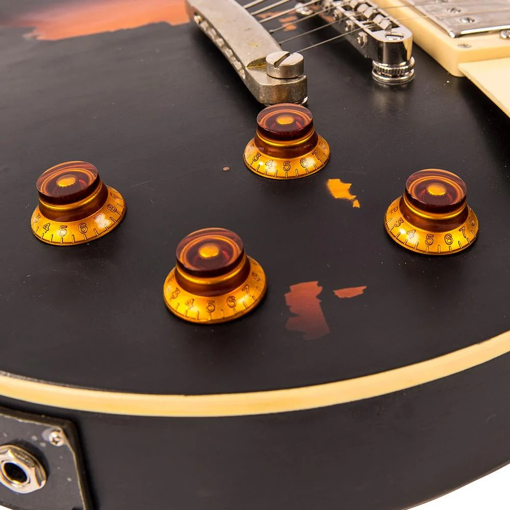 Vintage V100 ICON Electric Guitar ~ Distressed Black Over Sunburst (V100MRBK) | Musician Madness
