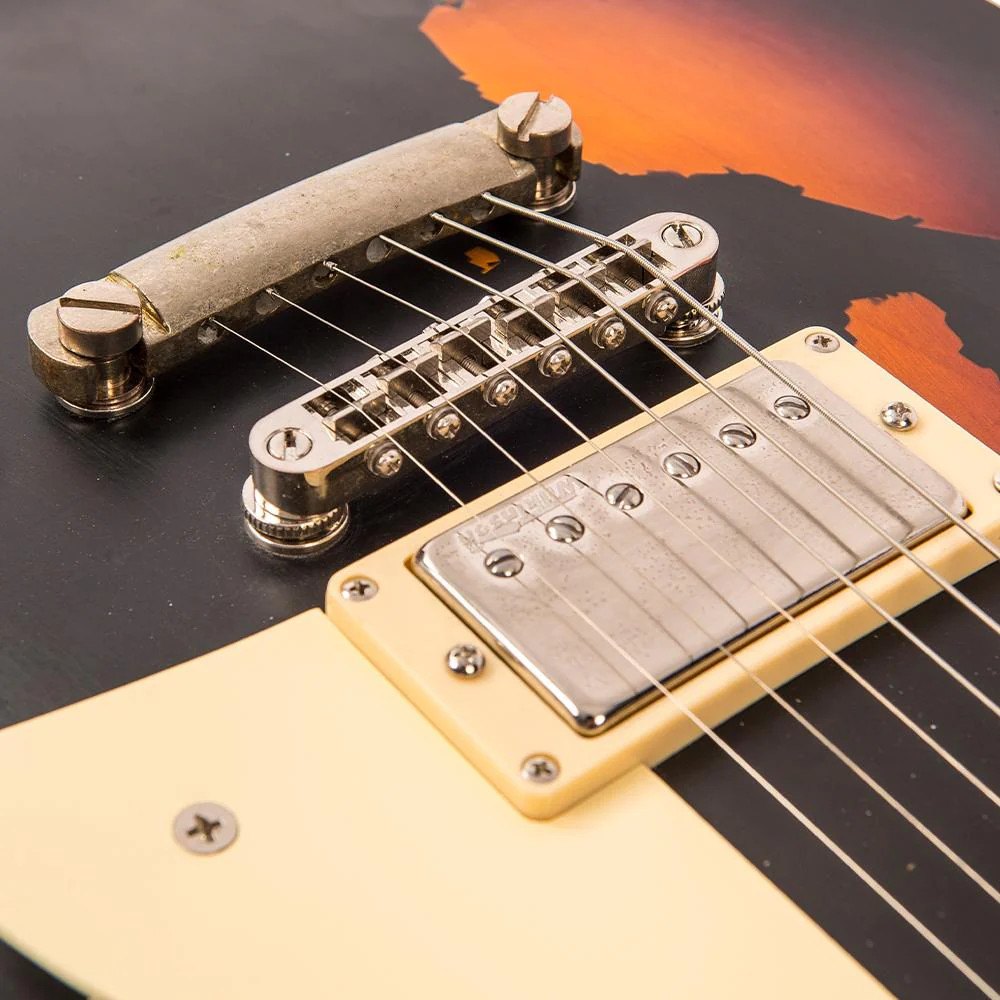 Vintage V100 ICON Electric Guitar ~ Distressed Black Over Sunburst (V100MRBK)