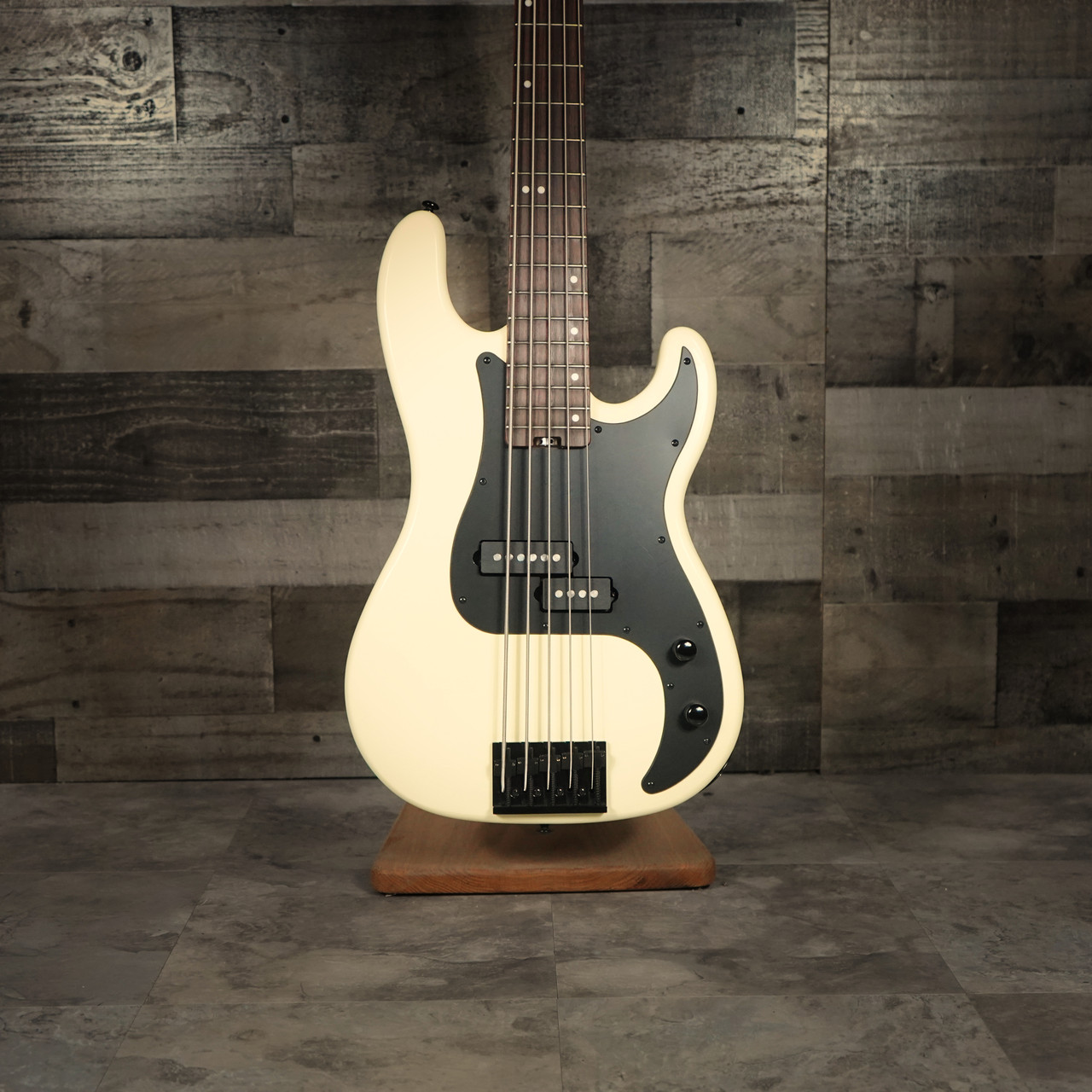 Schecter P-5 Ivy 5-string electric bass featuring a sleek ivy green finish, classic P-style body, powerful pickups, smooth-playing neck, and extended low-range performance.