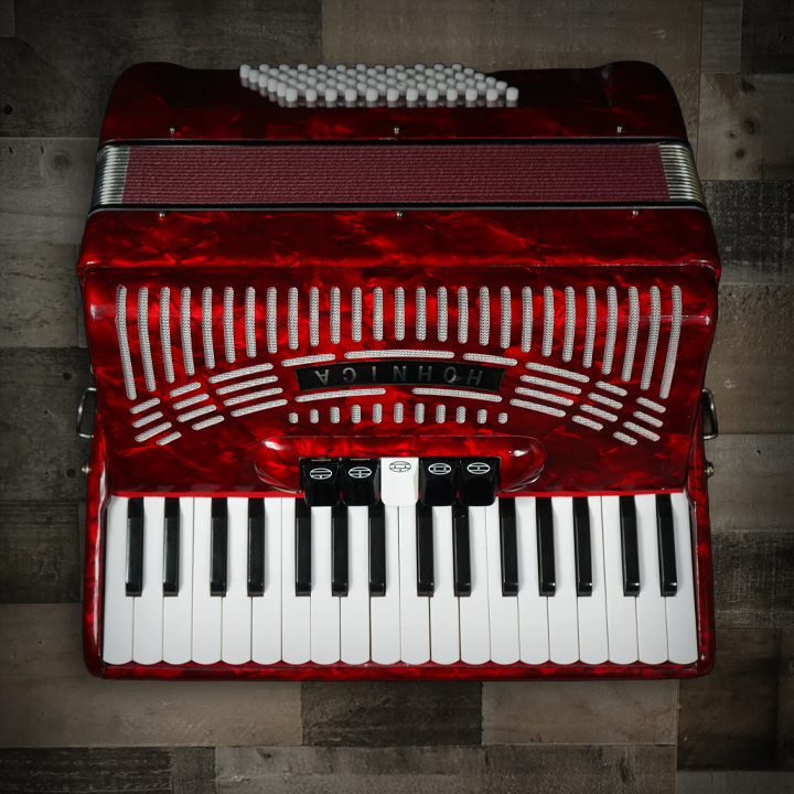The Hohner Hohnica 1305 72-Bass Pearl Red Accordion offers rich tone, smooth playability, and Hohner qualityÃ¢â‚¬â€perfect for students and hobbyists. Shop now!