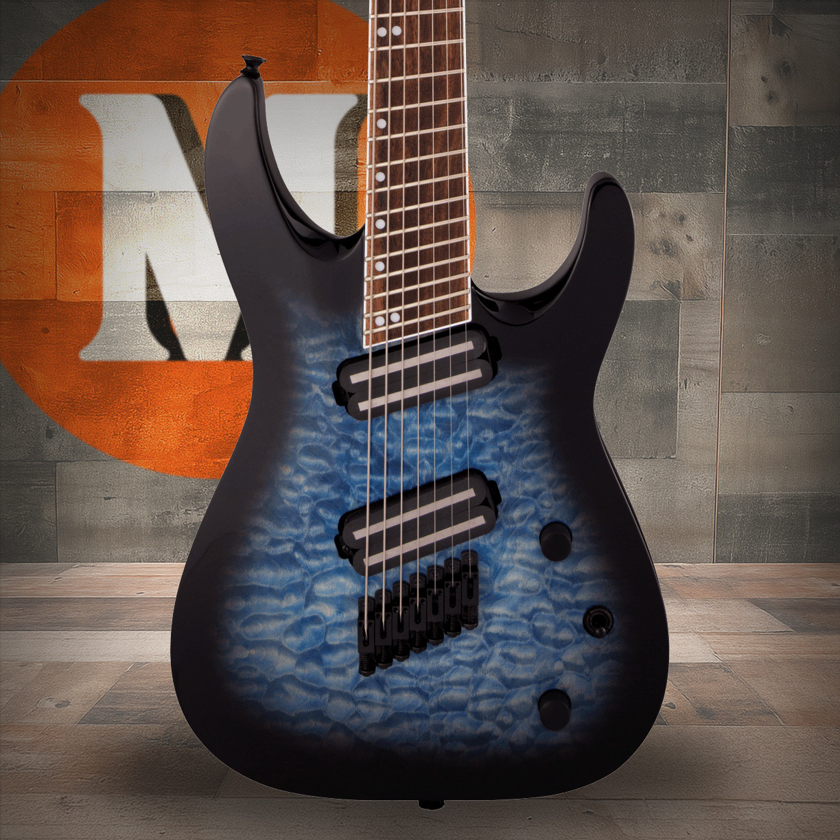 Jackson X Series Soloist Arch Top SLATX7Q MS - Laurel Fingerboard - Multi -Scale - Transparent Blue Burst | Musician Madness