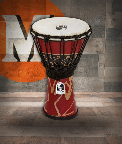 The Toca Synergy Freestyle 7" Djembe (SFDJ-7RP) features a lightweight synthetic shell with a pre-stretched synthetic head for consistent tone and easy maintenance. Its red finish adds vibrant visual appeal, while the compact size makes it ideal for young players, drum circles, travel, and educational settings. Produces clear slaps and warm bass tones with minimal effort.