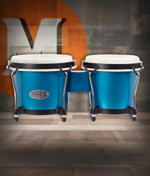 The Toca Synergy Wood Bongos (2100-OB) include 6" and 6-3/4" wood shells finished in a stylish matte ocean blue. Designed for warm, resonant tone and comfortable playability, these bongos feature durable hardware, natural hide heads, and dependable constructionâ€”ideal for students, casual players, and hobbyist percussionists.