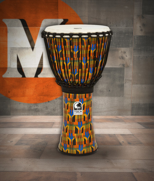 The Toca Freestyle 12" Djembe (SFDJ-12K) features a lightweight synthetic shell with a pre-stretched synthetic head that delivers warm bass tones and crisp slaps. Its colorful Kente design adds visual flair while maintaining durability. Ideal for drum circles, educational settings, practice, and performers needing a portable, reliable hand drum.