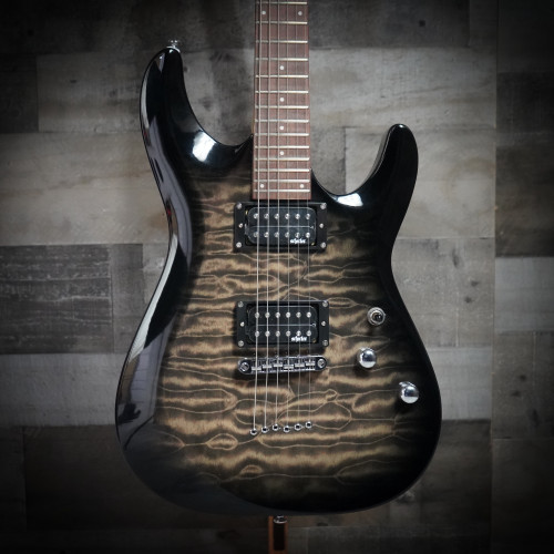 The Schecter C-6 Plus in Charcoal Burst (446) features an eye-catching quilted maple top paired with a lightweight body for comfortable playability. High-output humbuckers deliver punchy, versatile tone suitable for rock, metal, blues, and everyday practice. Complete with a smooth thin-C neck and SchecterÃ¢â‚¬â„¢s dependable hardware, i-s a great fit for both beginners and intermediate players.