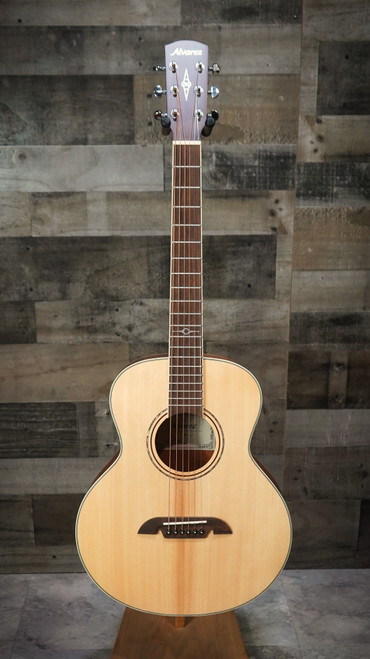 The Alvarez ALJ2 Artist Little Jumbo Travel Acoustic Guitar features a scaled-down jumbo body that provides surprising volume, projection, and warmth for its size. Crafted with quality tonewoods and Alvarez's signature construction, it offers excellent playability and tonal clarity. Lightweight and portable, it includes a padded gig bagâ€”making it ideal for travel, practice, and on-the-go musicians.