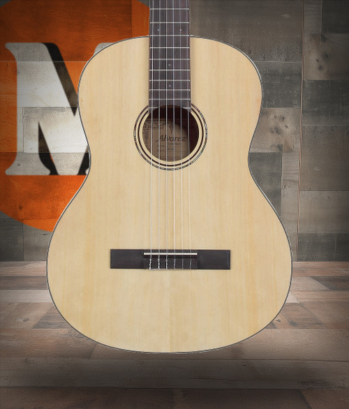 The Alvarez Regent RC26 Classical Guitar (RC26) features a spruce top with mahogany back and sides, delivering warm, mellow nylon-string tone ideal for beginners and developing musicians. With a comfortable neck profile and smooth fingerboard, it supports easy playability, while the included deluxe padded gig bag offers added protection for travel and lessons.