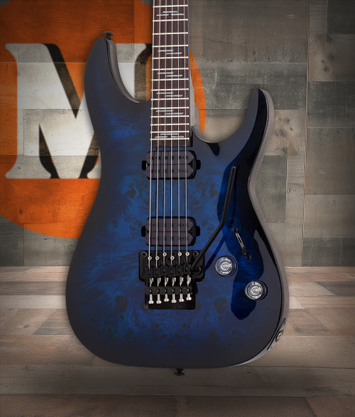Schecter Omen Elite-6 FR Electric Guitar - Ocean Blue Burst featuring quilted maple top, Floyd Rose tremolo, Schecter Diamond pickups, and sleek black hardware for modern tone and style