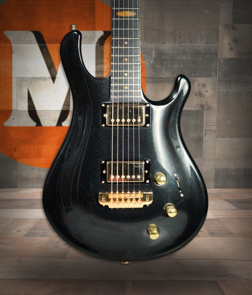 Flaxwood Rautia Glossy Black w/ Gold Hardware (Used)