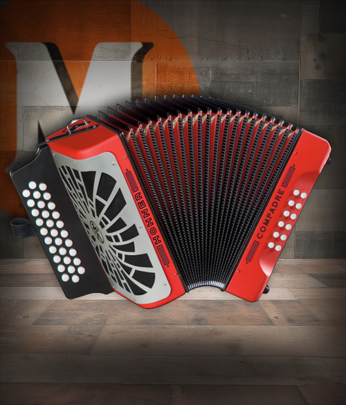 Hohner COFR-N Compadre FBbEb Accordion in Red with silver grille, diatonic button layout, and included gig bag.