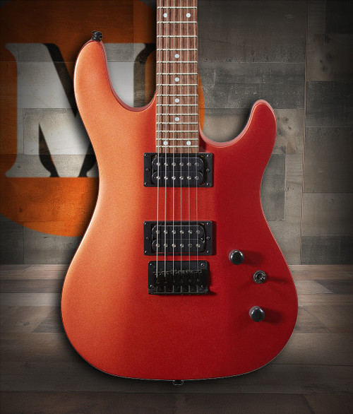 Cort KX100IO KX Series Electric Guitar in Iron Oxide finish featuring dual humbuckers, contoured body, and high-performance hardware – available at Musician Madness.