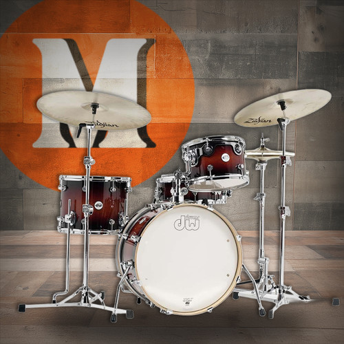 DW Design Frequent Flyer 4-Piece Drum Set in Tobacco Burst finish featuring 20" bass drum, maple shells, and compact professional setup â€“ available at Musician Madness.