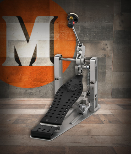 DW MFG Series Machined Direct Drive Single Pedal Graphite Edition with carry bag, featuring precision-machined aluminum body, dark graphite finish, and responsive direct drive mechanism.