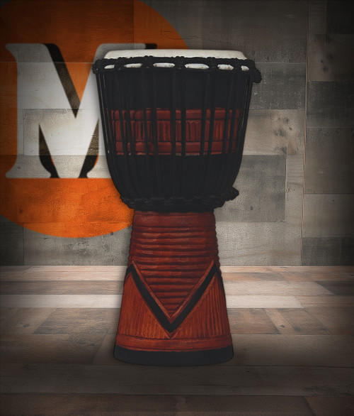 Latin Percussion LP713SB World Beat Wood Art Small Djembe featuring a hand-carved wooden shell, black and brown artistic finish, rope tuning, and warm resonant tone ideal for world percussion and recreational drumming.