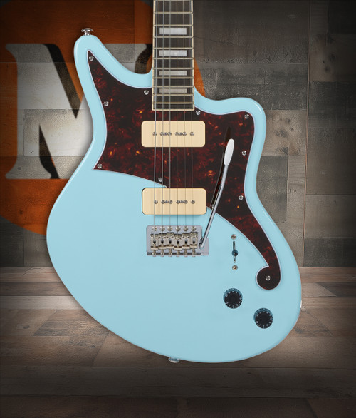 DÃ¢â‚¬â„¢Angelico Premier Bedford - Sky Blue Metallic (DAPBEDSBMCTR) featuring an offset body shape, versatile pickups, comfortable neck profile, and a striking Sky Blue Metallic finish for modern rock and alternative styles.