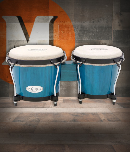 The Toca Synergy Bongos (2100BB) feature 6" and 6-3/4" shells with a bold blue finish and durable construction. Equipped with natural rawhide heads and sturdy black hardware, these bongos produce warm, resonant tone with reliable projection, making them ideal for students, hobbyists, and everyday percussion use.