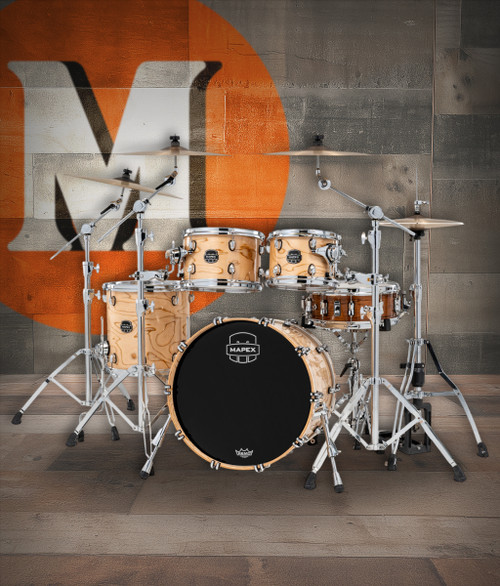 The Mapex Saturn VI SR504XZXN Fusion 4-Piece Shell Pack features hybrid maple/walnut shells that provide rich low-end presence, smooth mids, and crisp high-end definition. Finished in an Exotic Natural Burl, this kit offers boutique aesthetics paired with professional performance. SONIClear bearing edges ensure stable tuning and optimal resonanceâ€”perfect for drummers seeking articulate punch and tonal versatility in both live and studio settings.