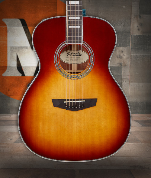 The Tammany Orchestra E Acoustic Guitar (DAPOMITBAPS) features an Orchestra-size body designed for balanced tone and comfortable playability. Its Iced Tea Burst finish adds eye-catching vintage style, while the smooth neck and warm acoustic response make it ideal for students, hobbyists, and players looking for an easy-to-play, great-sounding instrument.