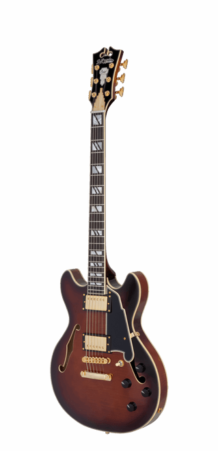 Dâ€™Angelico Mini Double Cutaway electric guitar in Amaretto Burst featuring a carved double-cut body, stop-bar tailpiece, humbucking pickups, vintage-style hardware, and classic Dâ€™Angelico craftsmanship.