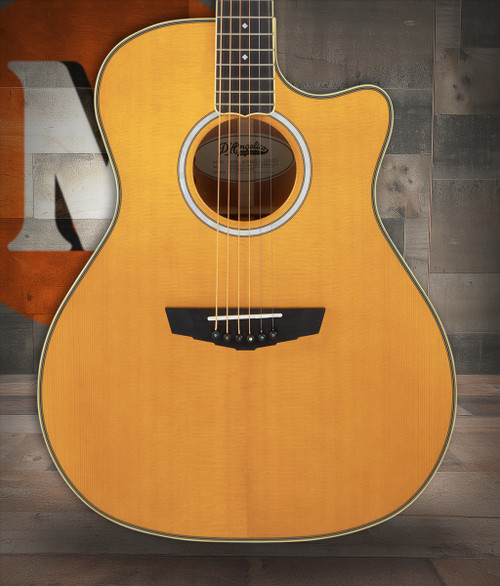 DÃ¢â‚¬â„¢Angelico Gramercy Grand Auditorium CE acoustic-electric guitar in Vintage Natural featuring a grand auditorium body, cutaway design, solid-tone construction, onboard electronics, and includes a padded gig bag.