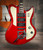 Schecter Ultra III Electric Guitar - Vintage Red finish featuring offset body design, dual humbuckers, chrome hardware, and smooth neck for a perfect balance of vintage aesthetics and modern performance