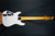 Schecter Demon-7 Electric Guitar - Vintage White (B-Stock) 7-string guitar with Schecter Diamond Active pickups, arched top body, black hardware, and smooth extended-range tone