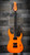 The Schecter USA Sunset Extreme Neon electric guitar in Neon Orange (7221) delivers premium USA-made craftsmanship, aggressive tone, and striking looks for modern rock and metal players. Available at Musician Madness.