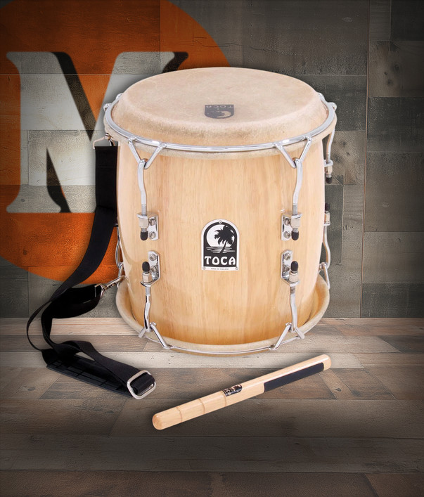 Toca Pro Tambora - Natural (TTAM-N) featuring natural wood shell construction, traditional Dominican tambora design, and durable hardware for authentic Latin percussion performance.