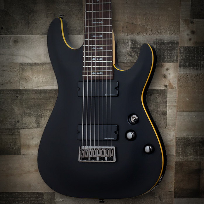 Schecter Demon-8 Left-Handed Electric Guitar – Aged Black Satin (B-Stock) featuring 8-string design, Schecter Diamond Active pickups, arched top body, and fast neck for left-handed metal players