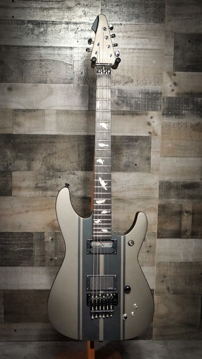 Schecter DJ Ashba Signature Electric Guitar – Carbon Grey finish featuring active pickups, custom body design, fast neck, and stage-ready tone built for modern hard rock and metal