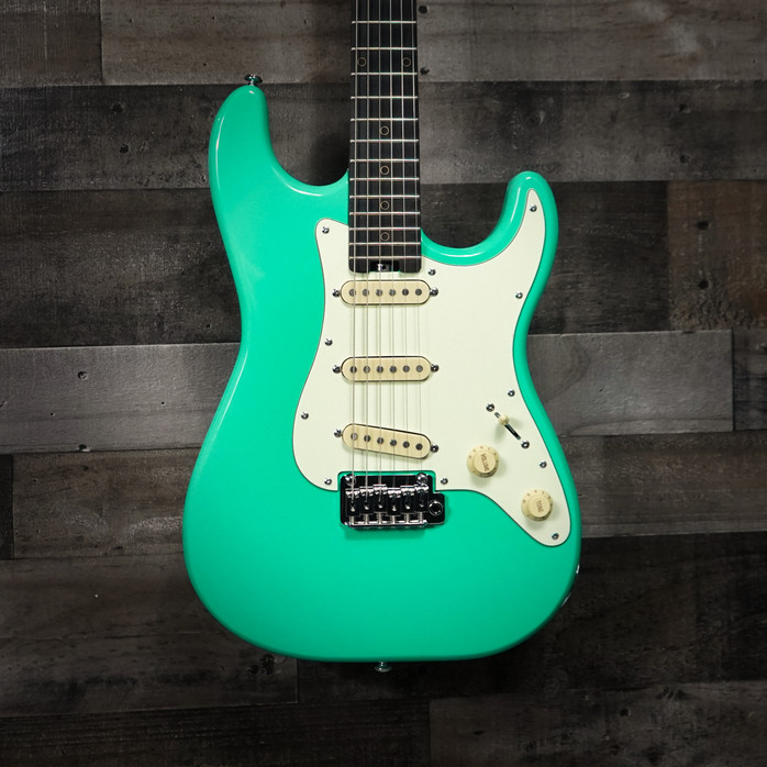 Schecter Nick Johnston Traditional Diamond Series Electric Guitar – Atomic Green (B-Stock) featuring roasted maple neck, single-coil pickups, vintage styling, and artist-level tone precision