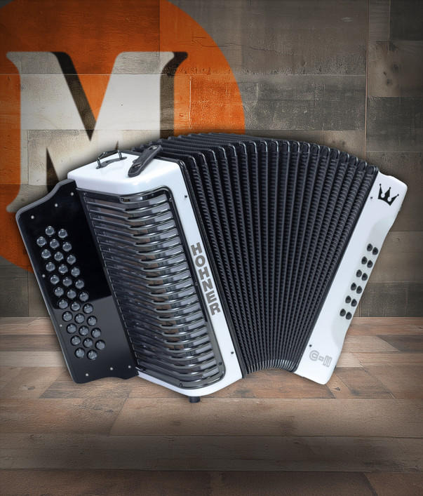 The Hohner Corona C-II GCF diatonic accordion in White Rainbow (C-II GCF WHRB) delivers classic Hohner tone and fast response, perfect for norteño, conjunto, and folk styles. Available at Musician Madness.