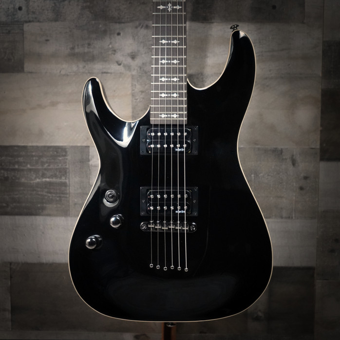 Schecter Omen-6 Left-Handed Electric Guitar in Gloss Black finish – dual humbuckers, contoured body, and hardware designed for left-handed players