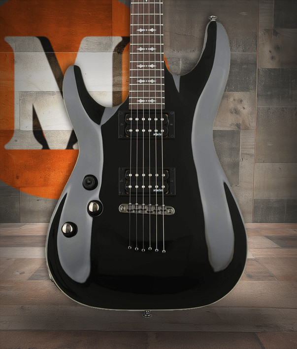 Schecter Omen-6 Left-Handed Electric Guitar in Gloss Black finish - dual humbuckers, contoured body, and hardware designed for left-handed players