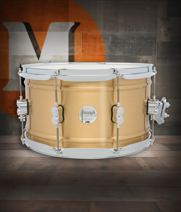 PDP Concept Series 8x14 Snare Drum in Natural Satin Brushed Brass with 1.2mm shell and chrome hardware, offering warm tone, crisp response, and classic brass appeal.